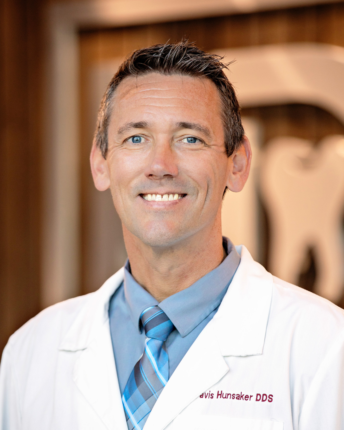 Dr. Travis Hunsaker, DDS, MAGD, FAAID, DABOI/ID - Hunsaker Dental