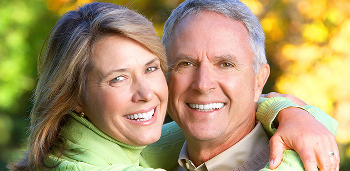 General Local Family Dentistry in Salem OR Middle age Couple Smiling after Dental Bridge Treatement